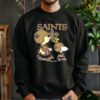 Charlie Brown Snoopy And Woodstock Walking NFL New Orleans Saints Shirt 3 sweatshirt