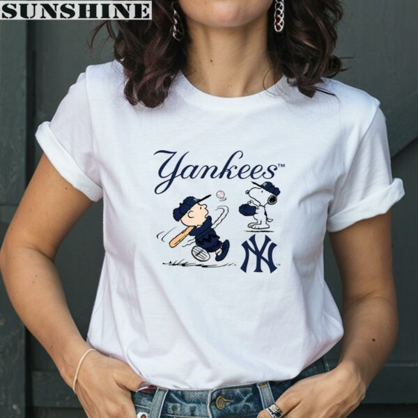 Charlie Brown And Snoopy Playing Baseball New York Yankees Shirt 2 women shirt