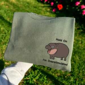 Embroidered Moo Deng Sweatshirt Embroidered Baby Pygmy Hippo Moo Deng Sweater Crewneck Embroidered Hold On Partner Im Overstimulated Shirt 1