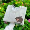 Embroidered Moo Deng Sweatshirt Embroidered Baby Pygmy Hippo Moo Deng Sweater Crewneck Embroidered Hold On Partner Im Overstimulated Shirt 2